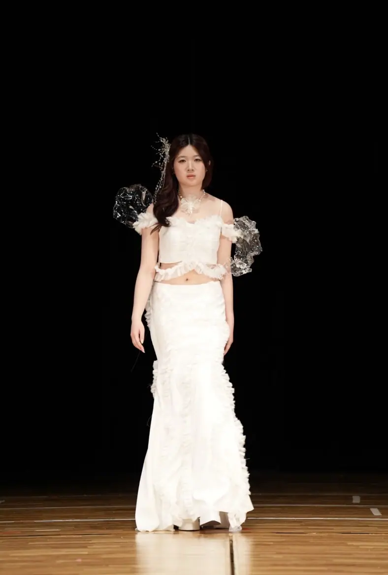 Model in a white gown